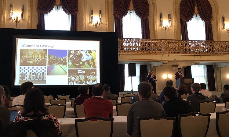 Image showing an opening slide at ASSETS'19 with Jeff Bigham visible on the stage