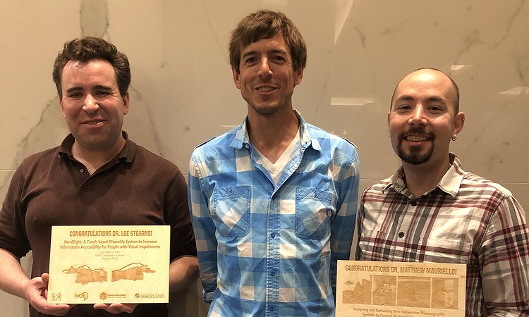 Picture of newly minted Drs. Matt Mauriello and Lee Stearns with their advisor Jon Froehlich
