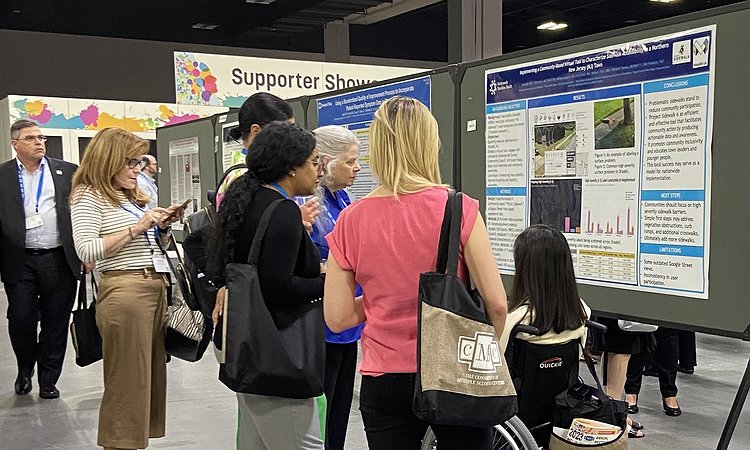 Kie presenting the Project Sidewalk poster at   EDUCATION HOMEPAGE 2023 Home Agenda Registration Travel and Housing Abstracts Supporters Scholarship Downloads and Links Patient Program  Consortium of Multiple Sclerosis Centers