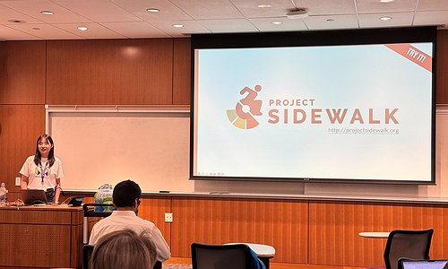 Chu Li presenting Project Sidewalk slides at the Allen School Research Showcase