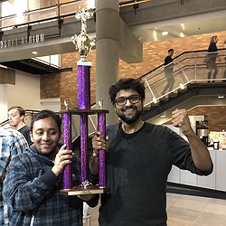 Venkatesh and Dhruv holding the TGIF trophy