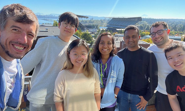 Professor Yuhang Zhao and the Makeability Lab on top of the Allen Center with the Cascades in the background