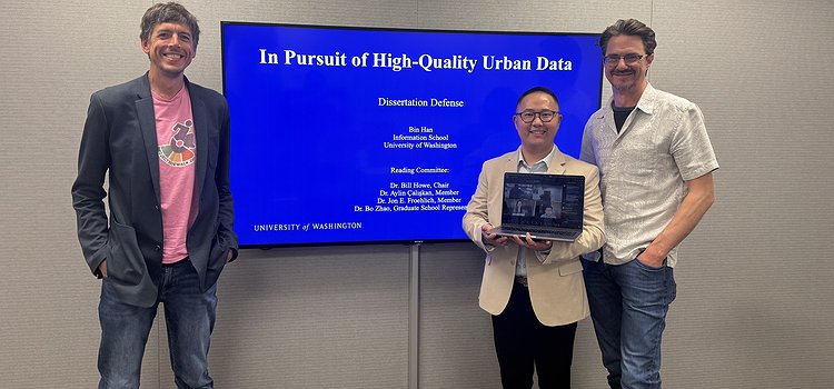 The dissertation committee standing in front of Bin's title slide