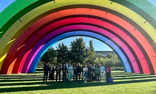 The middle of the Apple Park complex with a giant rainbow