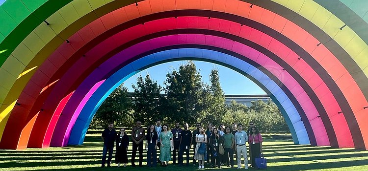 The middle of the Apple Park complex with a giant rainbow