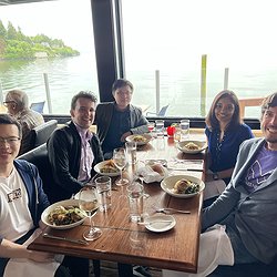 A picture of the Makeability Lab eating at Ray's Boathouse with water in the background