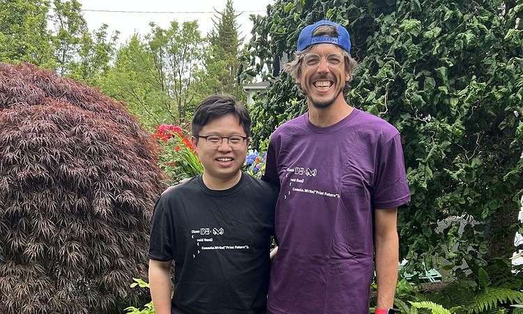 A picture of Liang and Jon wearing their new Deform Lab extends Makeability Lab t-shirts