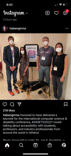 A screenshot of Haben Girma's Instagram showing me, Haben, Christian Vogler, and Kristen Shinohara in front of an ASSETS poster